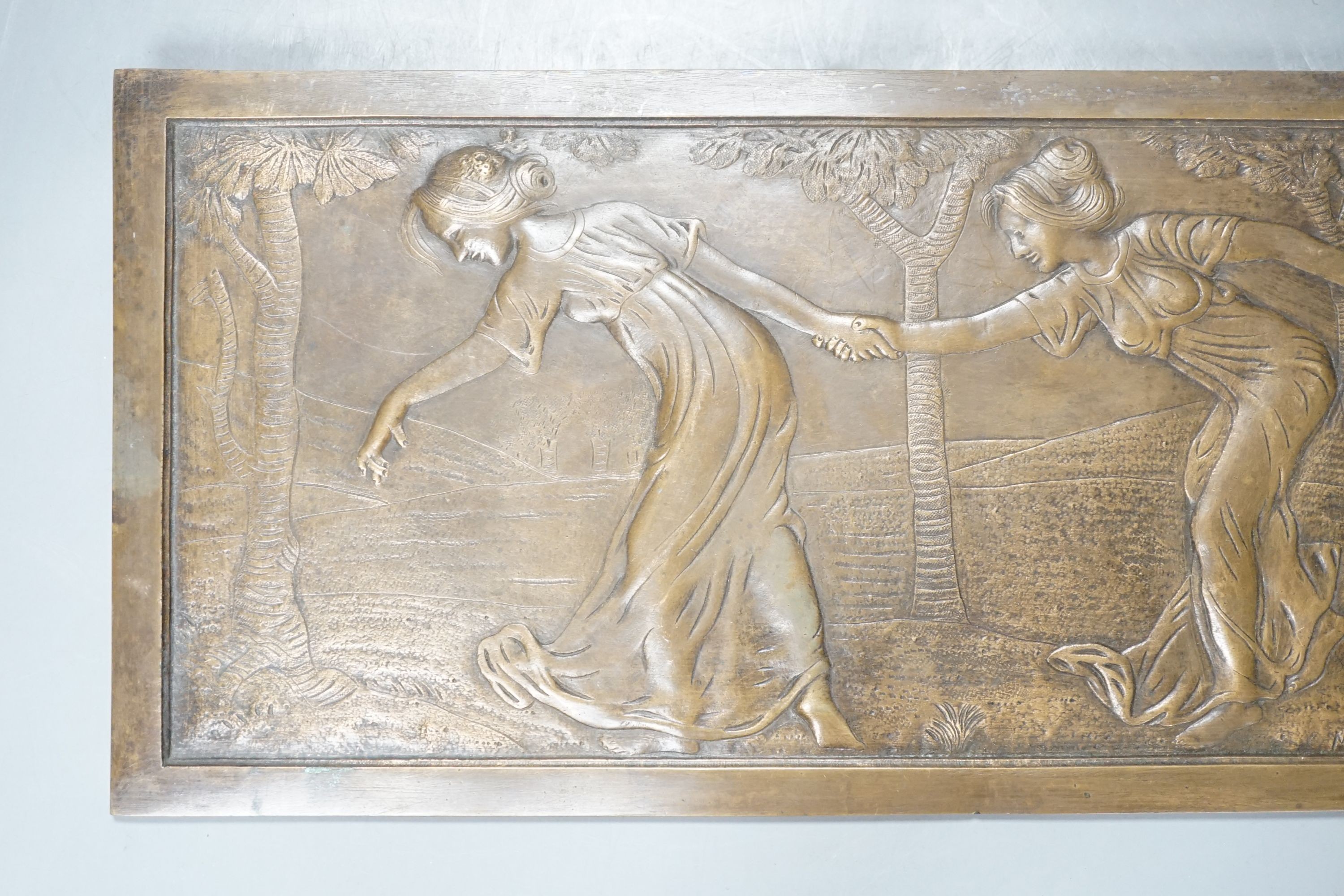 A signed M Jampolsky, Art Nouveau rectangular figural bronze plaque, 36.5 cms wide x 8 cms high.